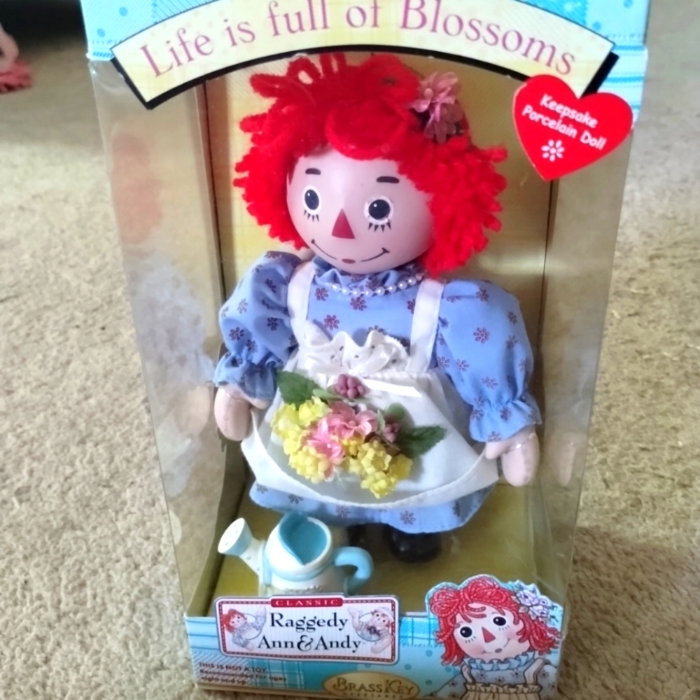 Brass Key Raggedy Ann Porcelain Keepsake Doll "Life Is Full of Blossoms"